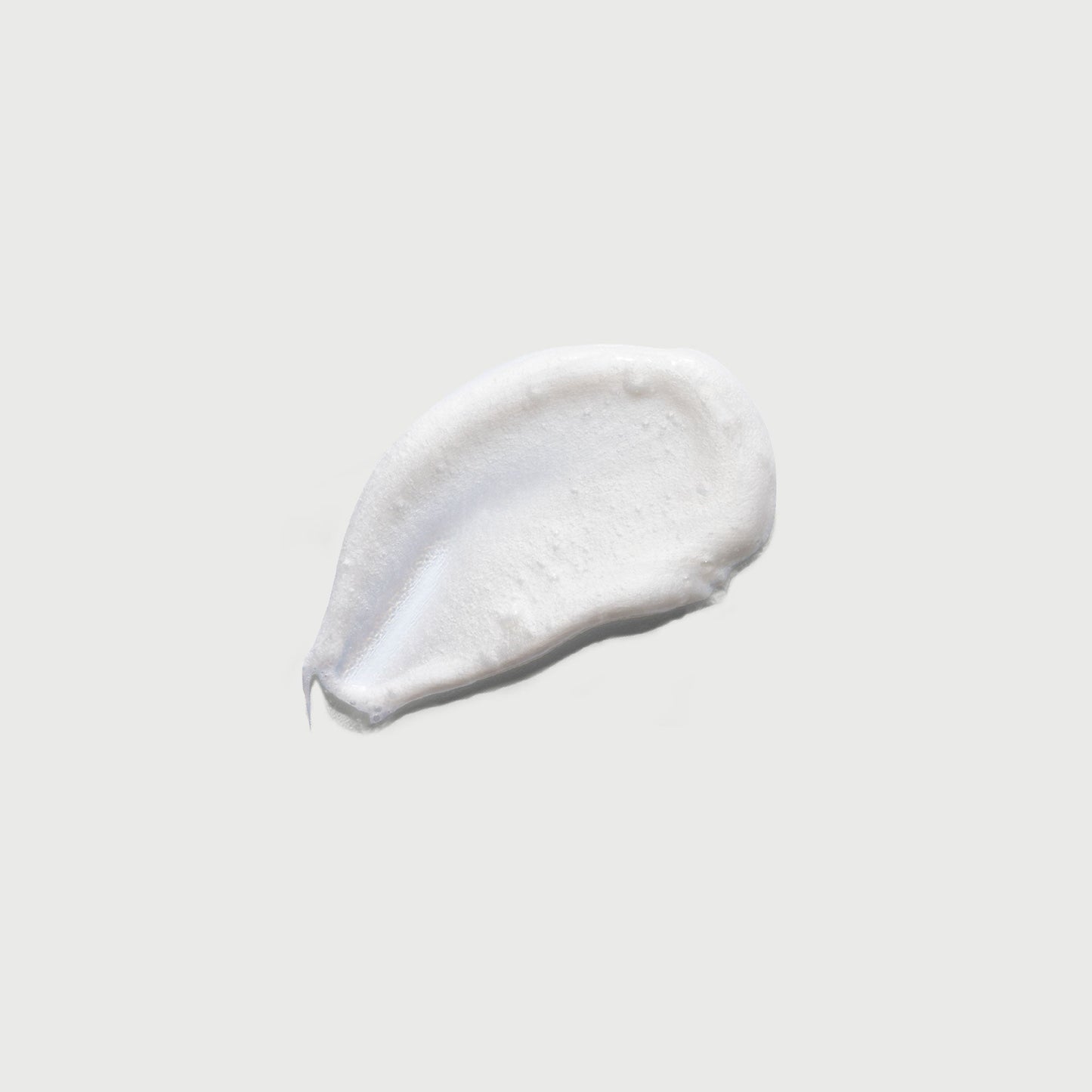 the-smoother-glycolic-acid-exfoliating-body-wash-y0 NATR-40002-Swatch-The-Smoother-Glycolic-Acid-Exfoliating-Body-Wash-bonebkgd.jpg
