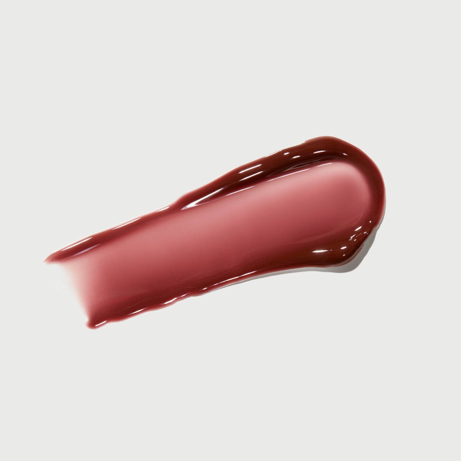phyto-glow-lip-balm-crimson-a9 NATR-10122-Swatch-Phyto-Glow-Crimson-bonebkgd.jpg