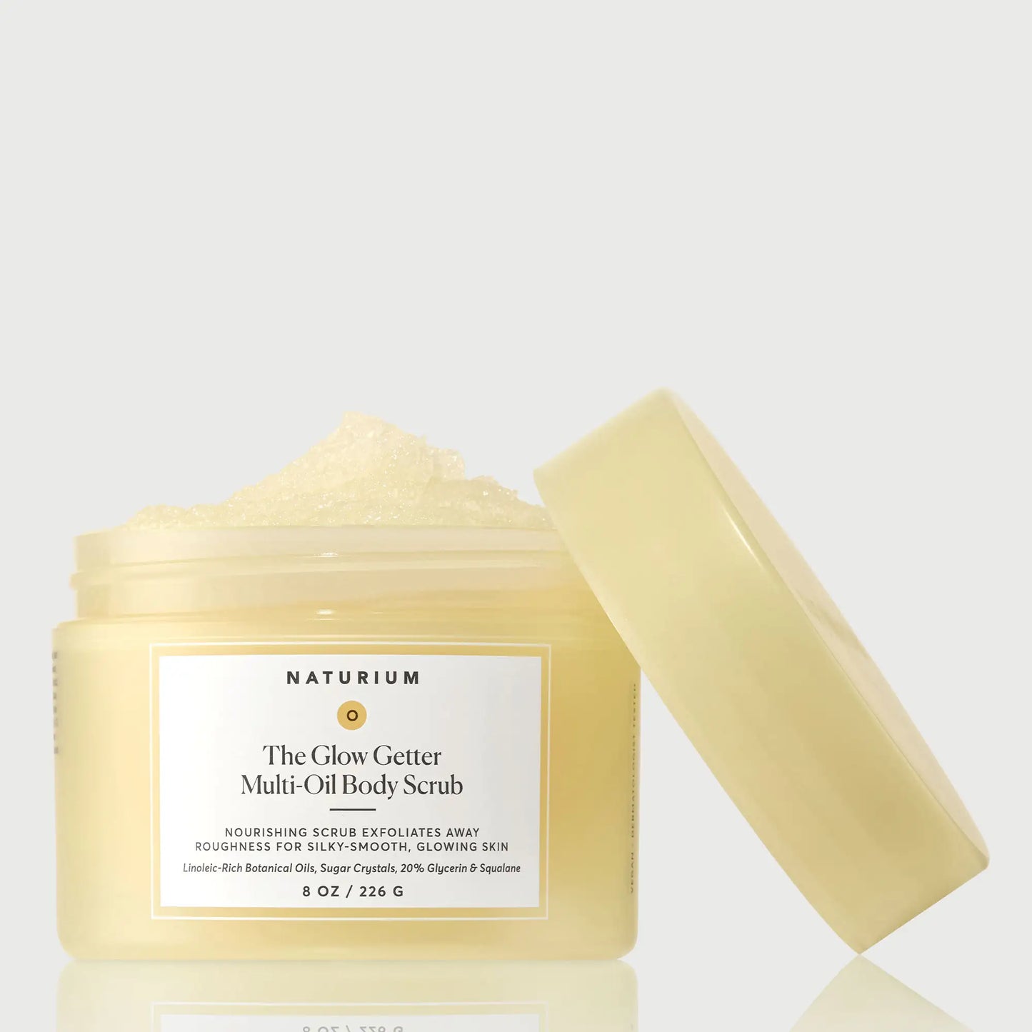 the-glow-getter-multi-oil-body-scrub-g0 NATR-40028-GlowGetter-Multi-Oil-Body-Scrub-Front-CapOff-bonebkgd.webp