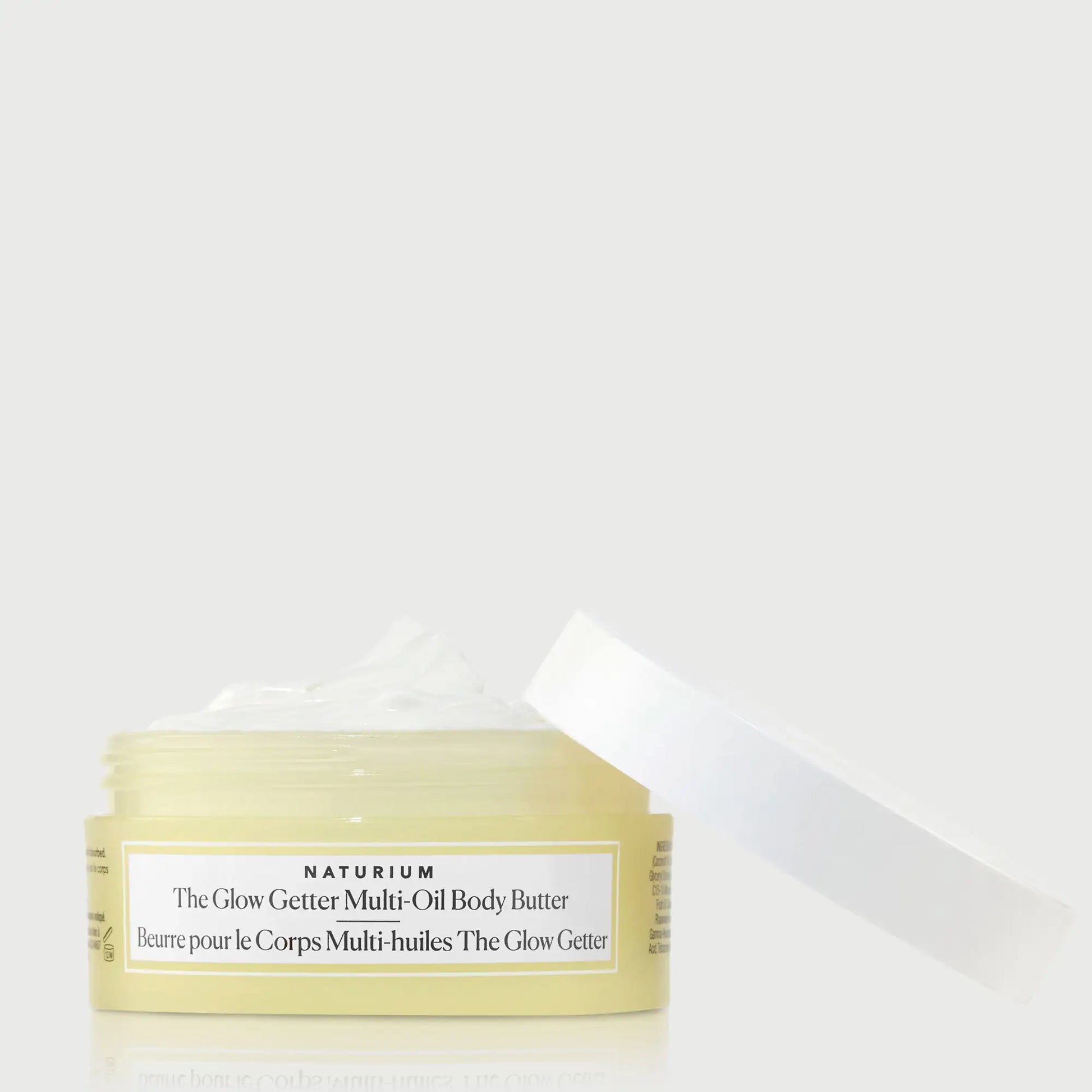 the-glow-getter-multi-oil-body-butter-travel-size-k9 NATR-40115_Glow-Getter-Body-Butter-Mini_front_capoff_bonebkgd.webp