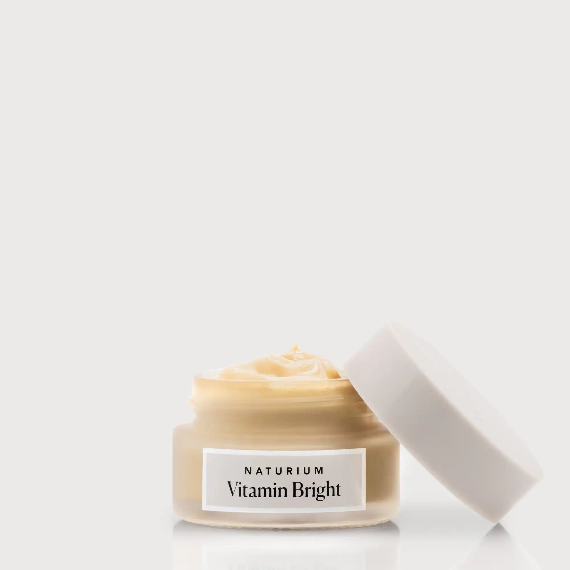 vitamin-bright-illuminating-eye-cream-h7 NATR-VitaminBright_LIGHT_Primary_front_openjar_bone.webp